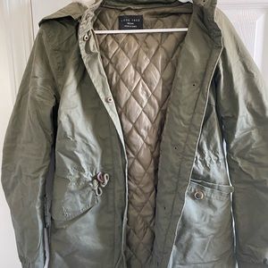 Fully lined coat with furry hood. Never worn!